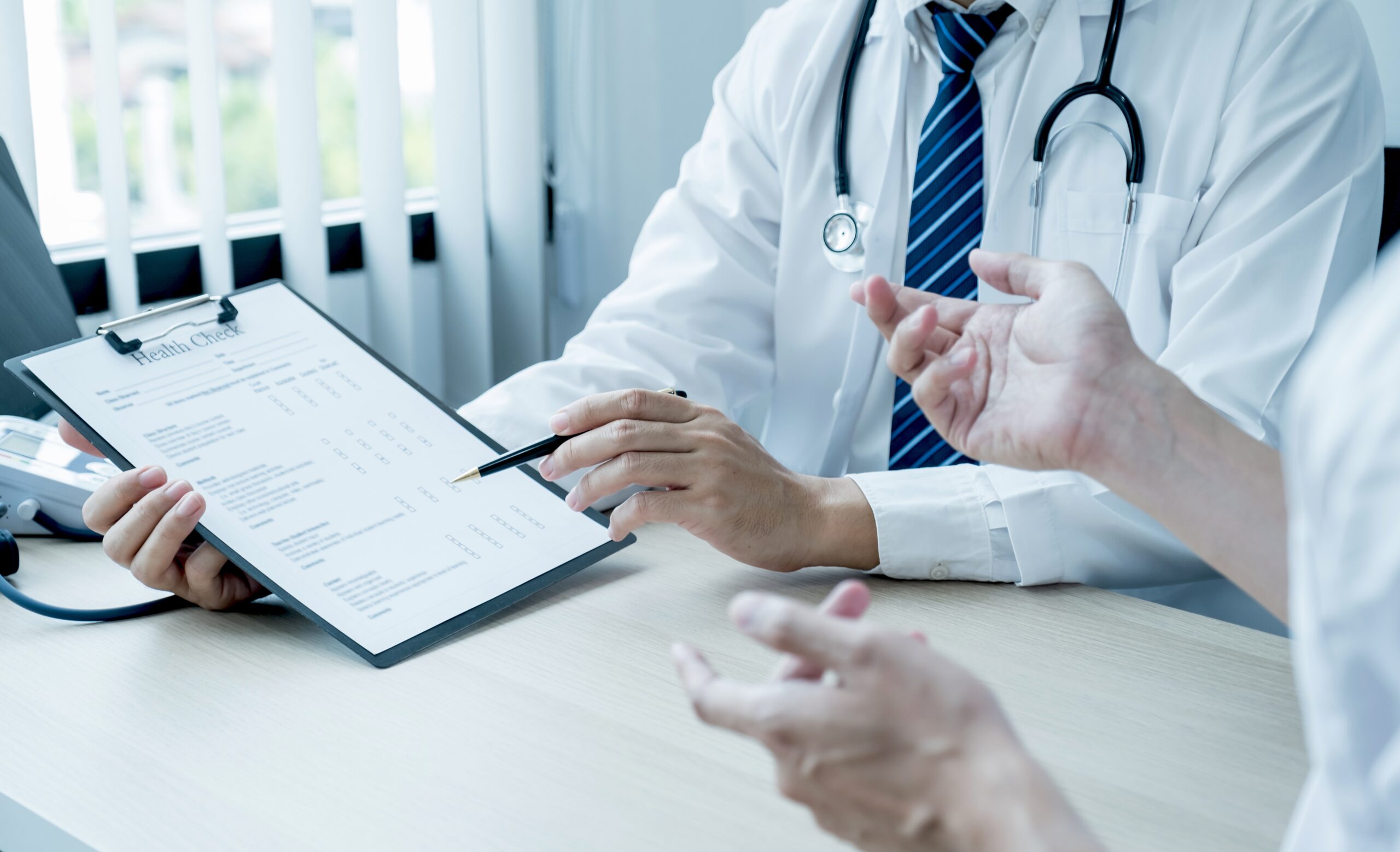 The doctor hand write report and explained the health examinatio
